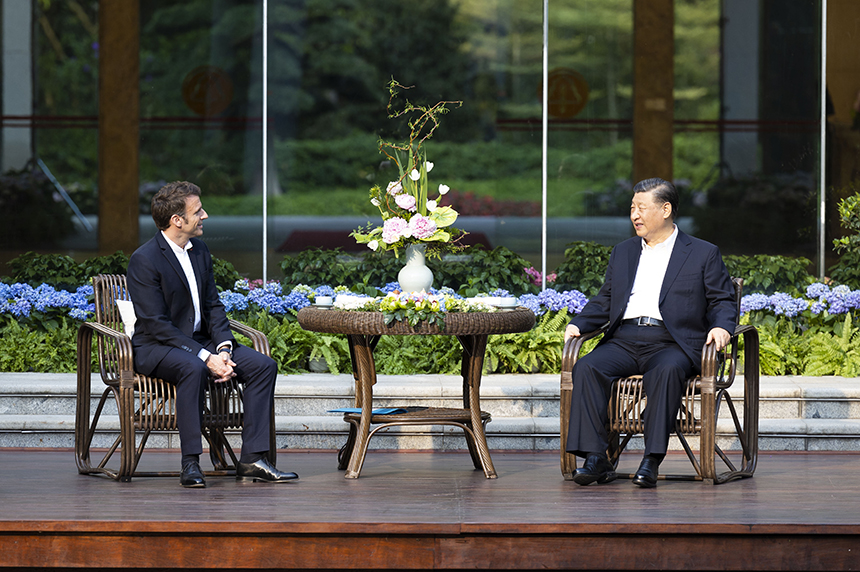 习近平同法国总统马克龙举行非正式会晤